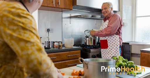 Older couple cooking in their home kitchen